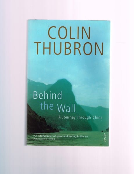 Behind the Wall : A Journey Through China